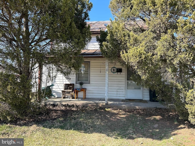 back of property with a patio area