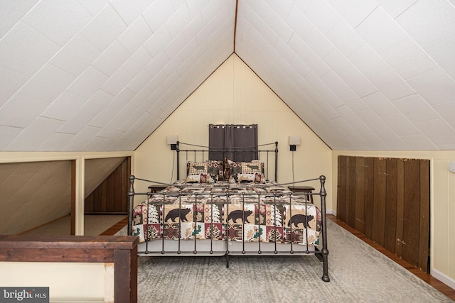 bedroom featuring vaulted ceiling