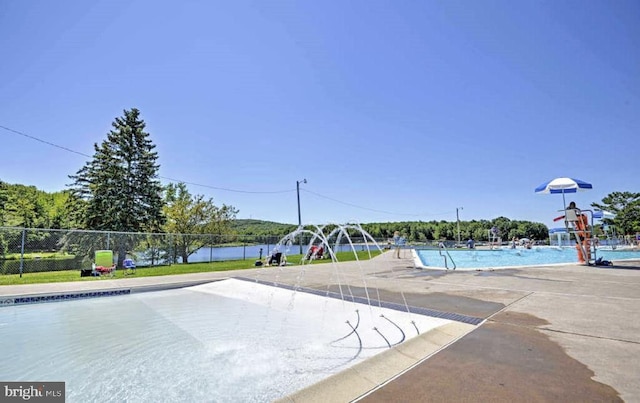 community pool with fence