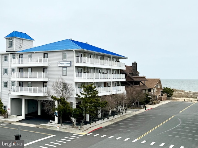 view of building exterior featuring a water view