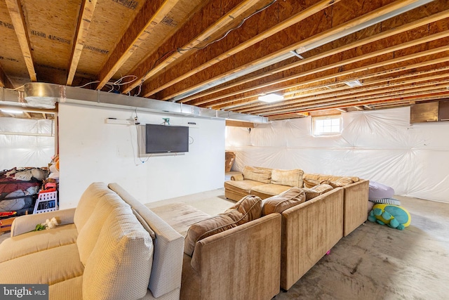 living room with concrete flooring