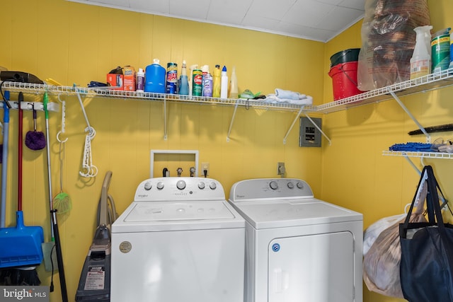 washroom with laundry area and washing machine and dryer