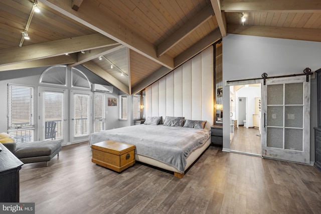 bedroom with a barn door, wood finished floors, wooden ceiling, and access to outside