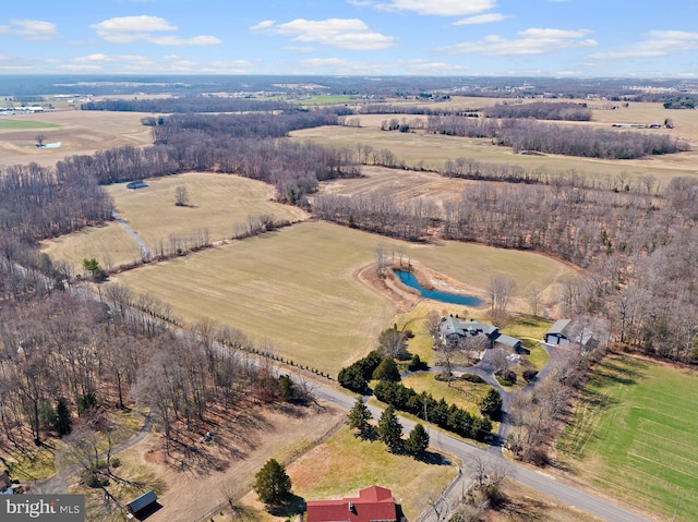 birds eye view of property featuring a rural view