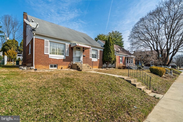 bungalow-style house featuring a front lawn, brick siding, and a chimney