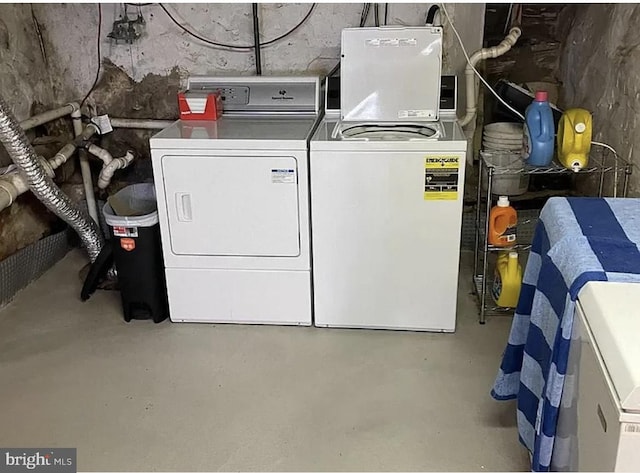 laundry area featuring independent washer and dryer and laundry area