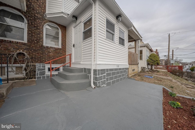 view of home's exterior with entry steps