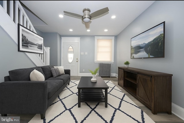 510 Woodcliffe Rd, Upper Darby, PA 19082 - living area with radiator, a ceiling fan, recessed lighting, stairway, and light wood-type flooring