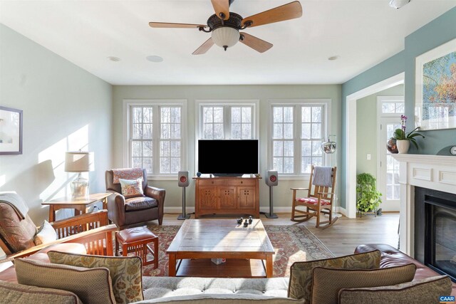 3535 Foxwood Dr, Barboursville, VA 22923 - living area with ceiling fan, baseboards, wood finished floors, and a glass covered fireplace