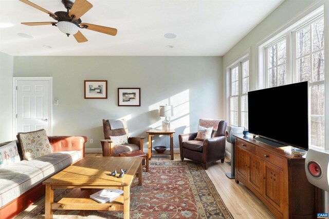 3535 Foxwood Dr, Barboursville, VA 22923 - living room with light wood-style flooring, baseboards, and ceiling fan