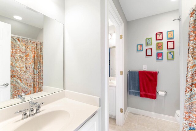 3535 Foxwood Dr, Barboursville, VA 22923 - full bathroom with tile patterned flooring, toilet, vanity, and baseboards