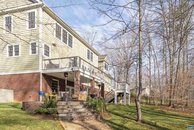 3535 Foxwood Dr, Barboursville, VA 22923 - back of house featuring stairway, a yard, and brick siding