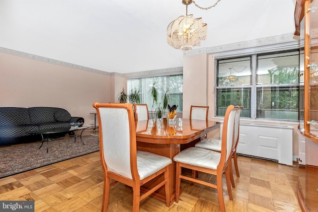 dining area featuring a chandelier