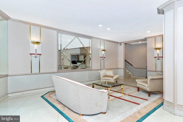 living area featuring stairs and recessed lighting