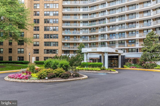 view of property with uncovered parking