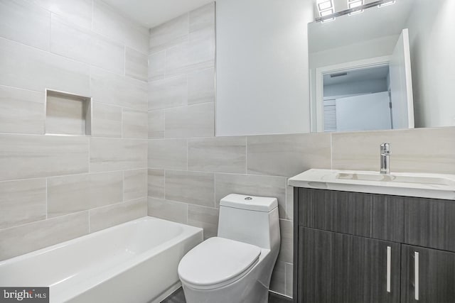 full bath with visible vents, toilet, tile walls, and vanity