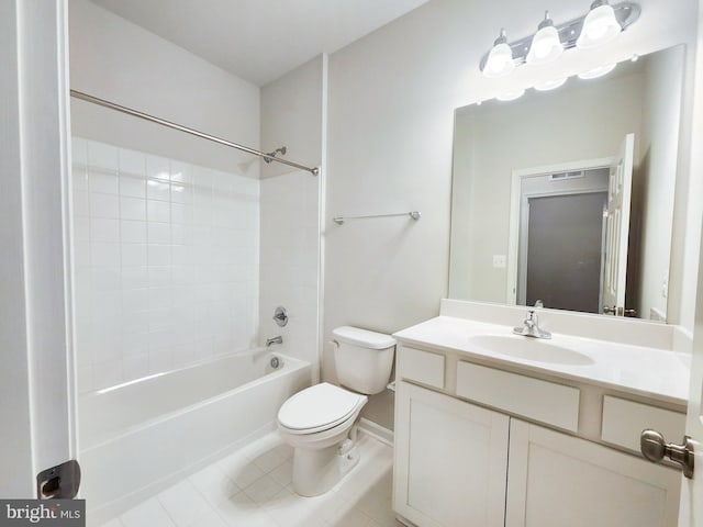 full bath featuring vanity, tile patterned floors, toilet, and shower / bath combination