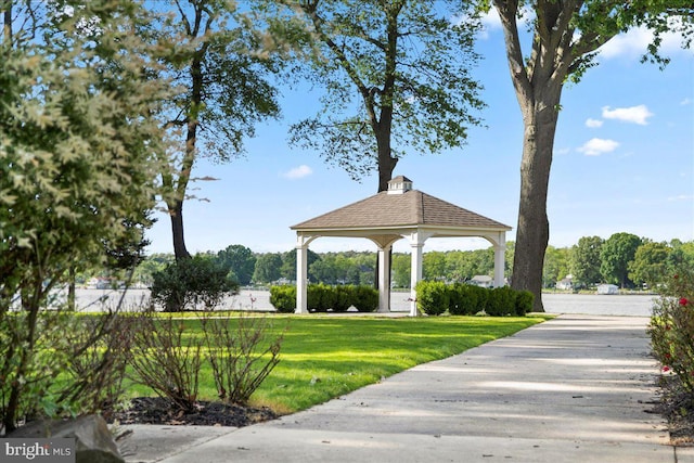 view of home's community with a gazebo and a lawn