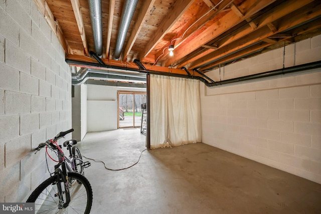 below grade area with concrete block wall