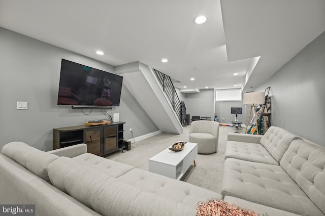 carpeted living area featuring stairway, recessed lighting, and baseboards