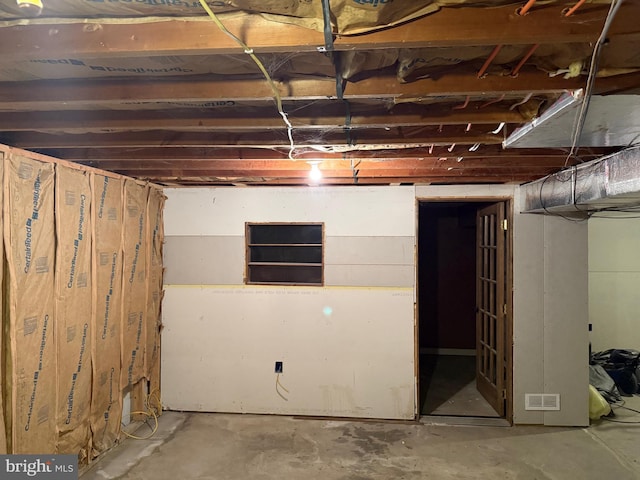 unfinished below grade area featuring visible vents