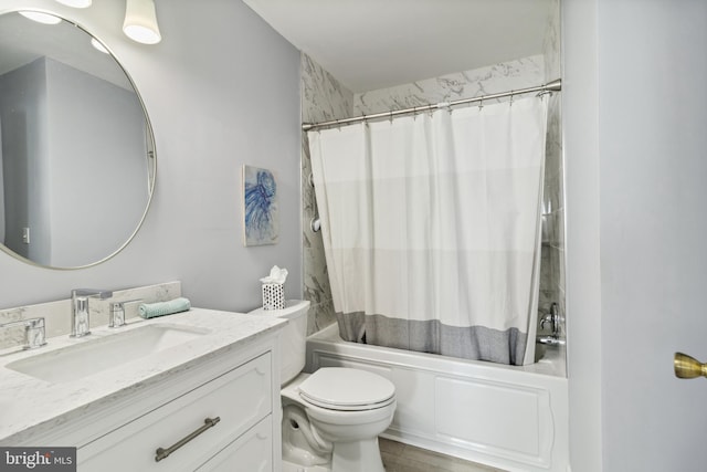 bathroom featuring toilet, vanity, and shower / tub combo with curtain