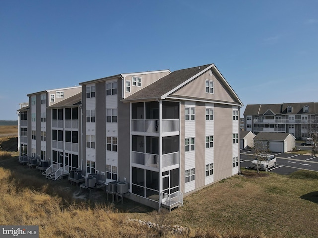 view of property with central air condition unit