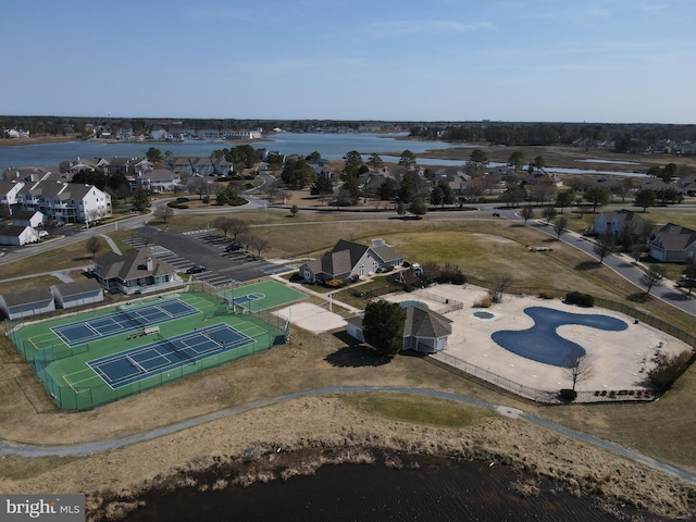 birds eye view of property with a residential view and a water view