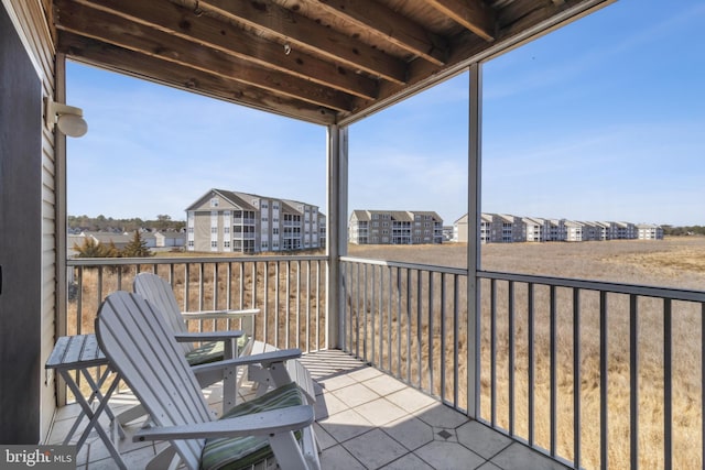 balcony featuring a residential view