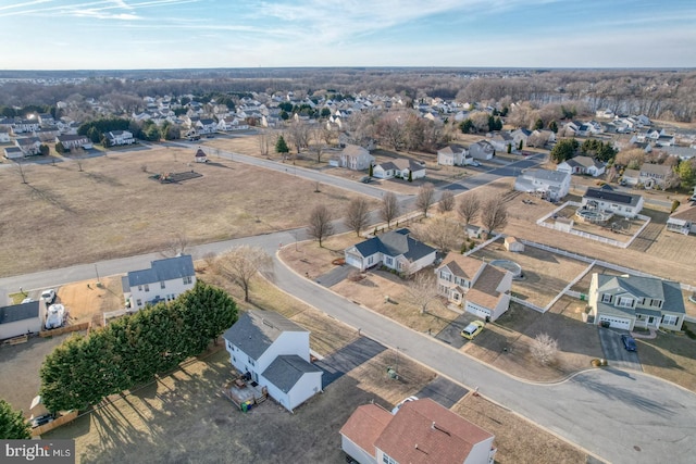 birds eye view of property with a residential view