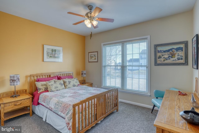 bedroom with baseboards, carpet, and ceiling fan