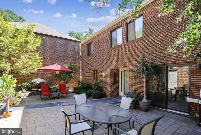 view of patio with outdoor dining area