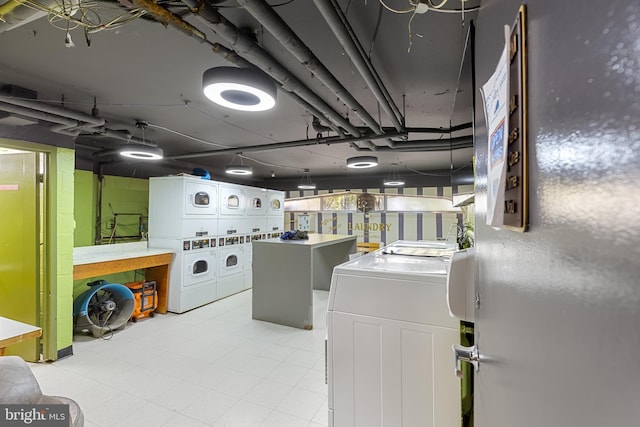 basement with stacked washer / dryer and washing machine and dryer