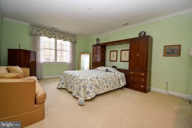 bedroom with visible vents, light colored carpet, baseboards, and ornamental molding