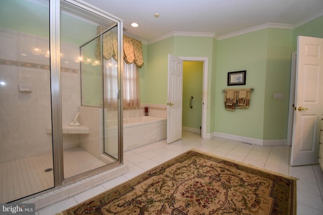 bathroom with tile patterned flooring, a bath, and crown molding
