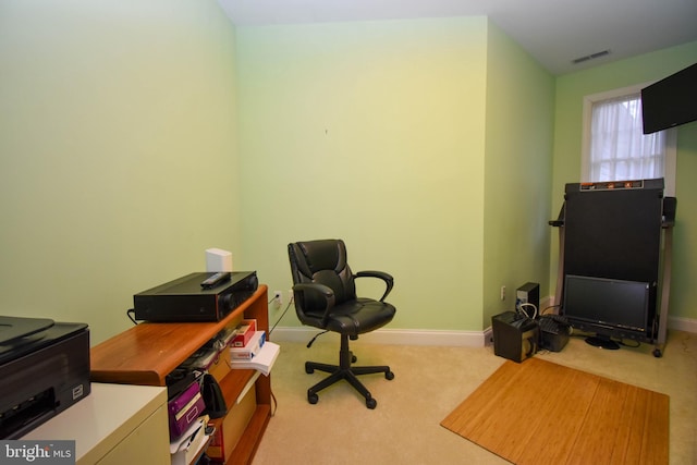 home office featuring carpet, visible vents, and baseboards