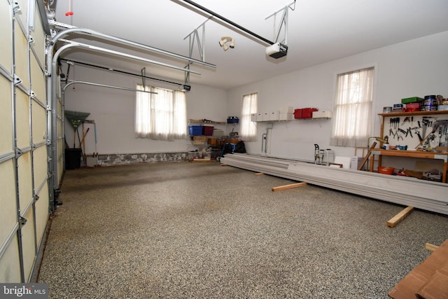 garage featuring a garage door opener