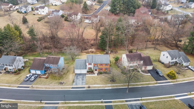 birds eye view of property with a residential view