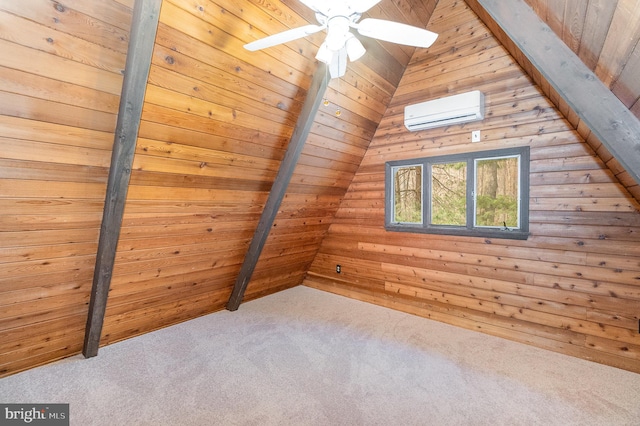 additional living space featuring wooden walls, ceiling fan, an AC wall unit, vaulted ceiling, and carpet flooring