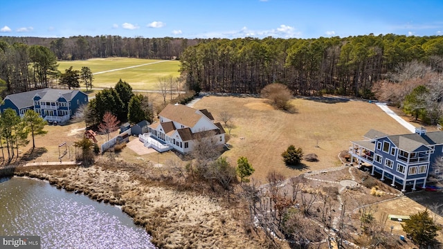 aerial view featuring a wooded view