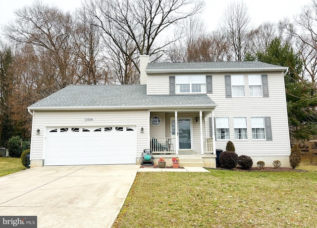 traditional-style home featuring a front lawn, covered porch, concrete driveway, an attached garage, and a chimney