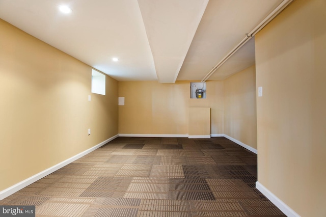 finished below grade area featuring recessed lighting, baseboards, and carpet floors