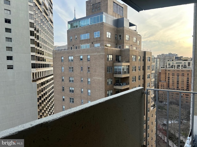 balcony featuring a city view