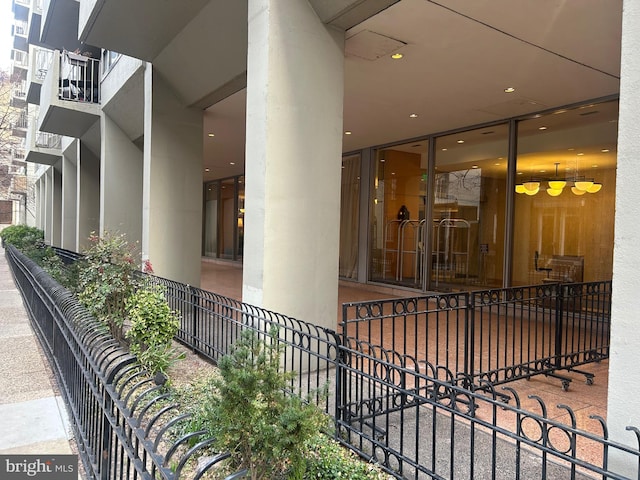 property entrance with fence