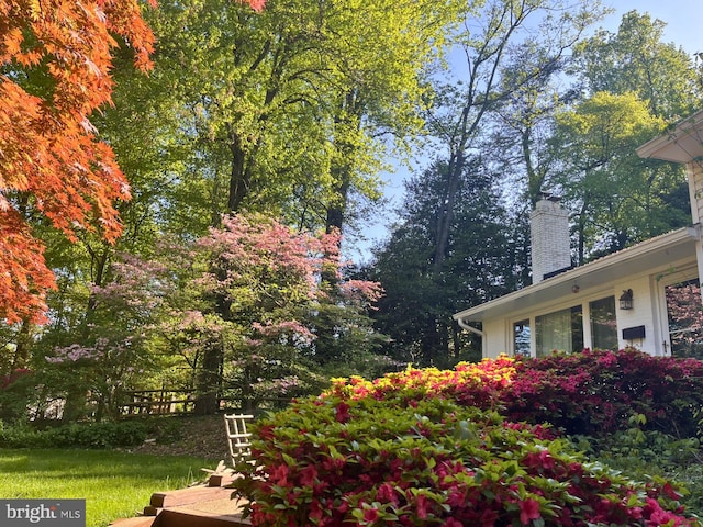 view of side of property featuring a chimney