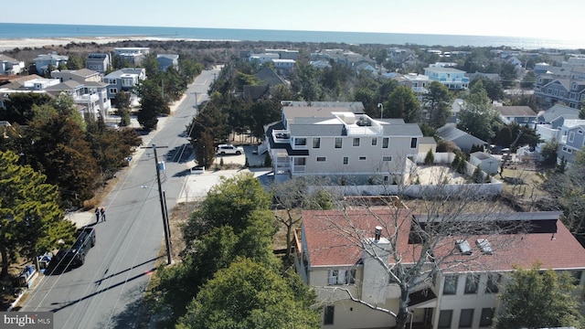 aerial view featuring a residential view and a water view