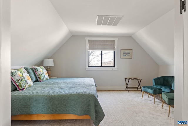 carpeted bedroom featuring visible vents, lofted ceiling, and baseboards