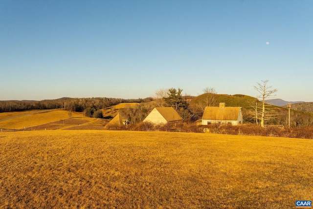 view of mountain feature with a rural view