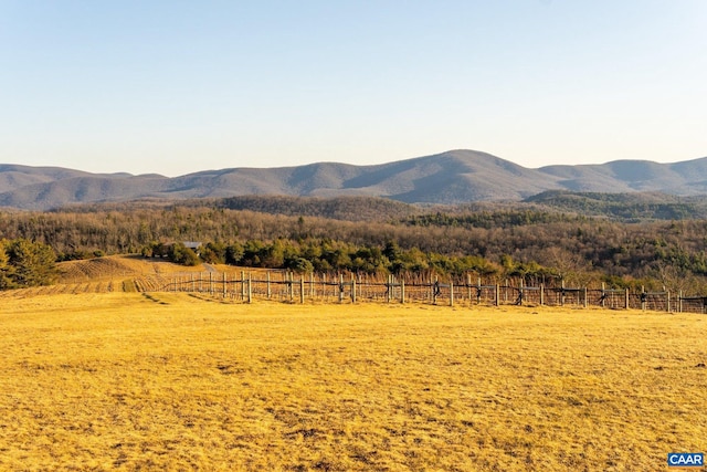 mountain view featuring a rural view