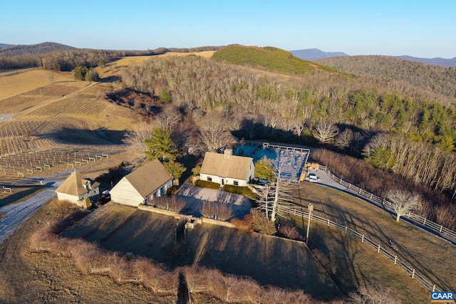 bird's eye view featuring a mountain view and a rural view